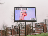 A screen displays information about Loredana concern in March amid concerns about the spread of Coronavirus in Cologne, Germany, on March 10...