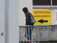Patient going to the Ambulatory Screening Service of the Nantes University Hospital, France on March 10, 2020 taking care of patients infect...