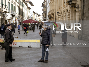 A man wears a protective respiratory mask in the center of Pisa, Italy March 10, 2020. Due to the spread of Covid-19 known as ''coronavirus'...