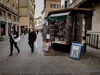 People wear  protective respiratory masks in the center of Pisa, Italy March 10, 2020. Due to the spread of Covid-19 known as ''coronavirus'...