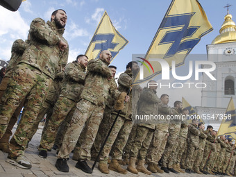 Ukrainian veterans of the 'Azov' volunteer battalion attend a rally dedicated to the Volunteer Day in honor of volonteer fighters who joined...
