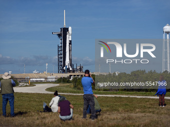  Members of the media take photographs as a SpaceX Falcon 9 rocket carrying the sixth batch of Starlink satellites for a planned constellati...