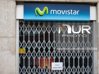 Movistar shop closed after the state of alarm imposed by the spanish government and measure of lockdown the population of Catalonia by the c...