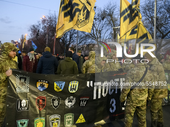 Ukrainian veterans of the Eastern Ukrainian conflict, volunteers and ordinary people during a rally outside the Russian embassy to mark the...