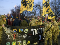 Ukrainian veterans of the Eastern Ukrainian conflict, volunteers and ordinary people during a rally outside the Russian embassy to mark the...