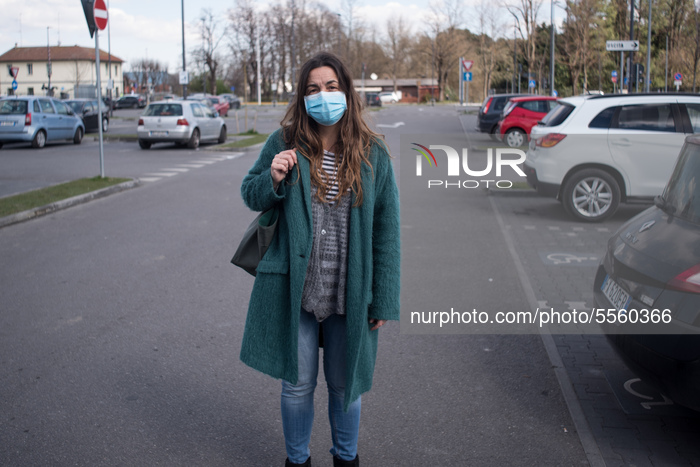 A girl wears a protective mask before going shopping in a supermarket in Faenza, Emilia-Romagna, 13 March 2020 (Photo by Andrea Neri/NurPhot...