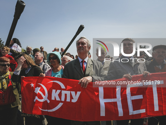Supporters of the Ukrainian Communist Party attend a rally to mark International Workers Day at the Ukrainian State Museum of the Great Patr...