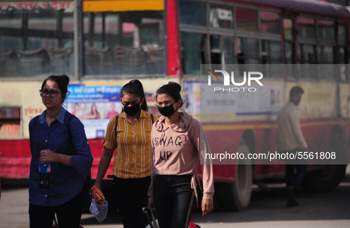 Passengers wearing mask to protect themselves from corona , at Bus station in Allahabad on March 19 ,2020 .The total number of novel coronav...