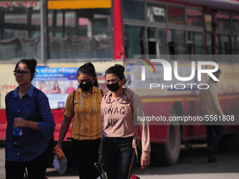 Passengers wearing mask to protect themselves from corona , at Bus station in Allahabad on March 19 ,2020 .The total number of novel coronav...