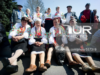 Eldery ladies dress up in tradition Ukrainian costume seen at the labour day rally held by the Communist party of Ukraine. - Hundreds of Ukr...