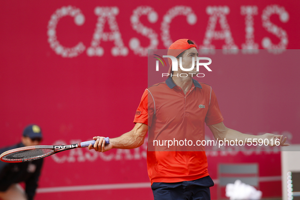 Spanish tennis player Guillermo Garcia-Lopez reacts during his Millennium Estoril Open ATP Singles semifinal tennis match with with French t...