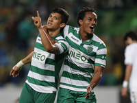 Sporting's forward Fredy Montero  (L)  celebrates his goal with Sporting's forward Andre Carrillo (R)  during the Portuguese League  footbal...