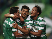 Sporting's forward Fredy Montero  (L)  celebrates his goal with Sporting's forward Andre Carrillo (R) and Sporting's defender Cedric  (L)  d...