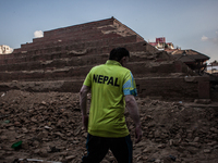 A man is criossing the broken heritgae of Durbar Square, Katmandu, nepal, 03 May 2015. (