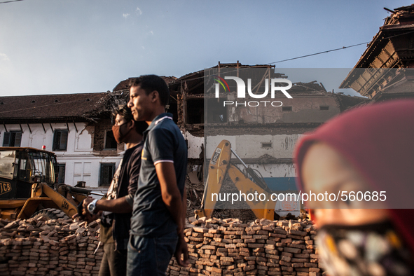 People are  crossing the broken heritgae of Durbar Square, Katmandu, nepal, 03 May 2015. 