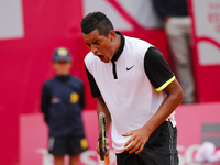 Australian tennis player Nick Kyrgios reacts after missing a point to French tennis player Richard Gasquet during their Millennium Estoril O...