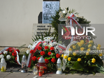 A view of the base of the Cross of Katyn surrounded with flowers and wreaths, on the day of the 10th anniversary of Smolensk crash disaster....