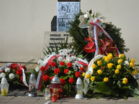 A view of the base of the Cross of Katyn surrounded with flowers and wreaths, on the day of the 10th anniversary of Smolensk crash disaster....