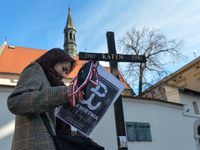 A lady carries a leaflet related to Smolensk crash disaster on the day of the 10th anniversary of Smolensk .
In the early hours of the morni...