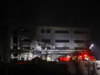 Firefighters carry out a search and rescue operation at the site of a fire that broke out at a warehouse construction site in Icheon, Gyeong...