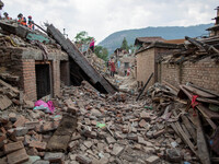 View from the collapsed village of Khokana, south of Kathmandu.
The death toll has risen to more than 7000 people and more than 13,900 have...