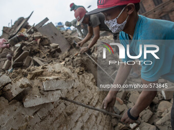 Nepalese Volunteers are breaking the damaged walls in order the clean the area and find goods from people.
2 weeks after the powerful and de...