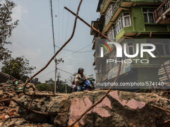 Their are lots of rubble in the street making barrier for transportation at Swambhu, Kathmandu, Nepal, 8 May 2015. (