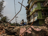 Their are lots of rubble in the street making barrier for transportation at Swambhu, Kathmandu, Nepal, 8 May 2015. (