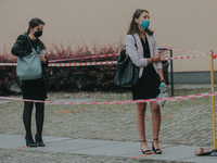 Students of the 12th high school are waiting for entry for the matura exam during pandemic on June 9, 2020 in Wroclaw, Poland. (
