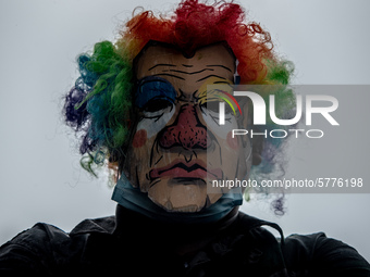 A man depicting Philippine President Rodrigo Duterte as a clown joins a protest against the Anti-Terror Bill on June 12, 2020 at the Univers...