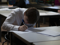   A year 10 pupil writing. Ortu Gable Hall School in Corringham, Essex return after a long break due to the COVID-19 pandemic on Tuesday 16t...