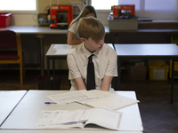   A year 10 pupil with work in front of him. Ortu Gable Hall School in Corringham, Essex return after a long break due to the COVID-19 pande...