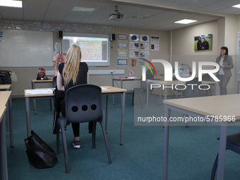   A year 12 pupil watches on as the teacher shows a video. Ortu Gable Hall School in Corringham, Essex return after a long break due to the...