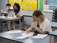  A Year 10 pupil doing her work. Ortu Gable Hall School in Corringham, Essex return after a long break due to the COVID-19 pandemic on Tuesd...