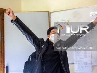 A student exults after the end of the exam in Turin, Italy on 17th June 2020. The final high school exam represents a return to class for st...