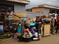 Residents gathering some remains of their properties before officials Lagos State Emergency Management begin the demolishing the remains of...