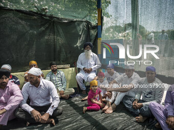 Italy, Sabaudia : Daily life in the Gurdwara Singh Saba, the place of worship for Sikhs, in Sabaudia, Italy center on May 10, 2015. (