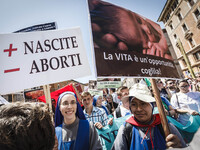 Nuns hold signs as they take part in the annual 'March for Life' in Rome, on 10 May 2015, to protest against abortion and euthanasia and to...