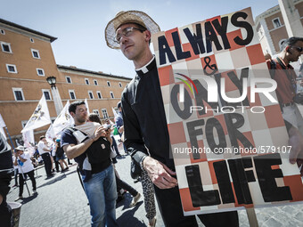 A priest attends the annual 'March for Life' in Rome, on 10 May 2015, to protest against abortion and euthanasia and to proclaim the univers...