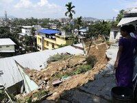 Debris piles after a landslide due to incessant rain, at Santipur Hillside in Guwahati, Assam, India on Friday, June 19, 2020.  (