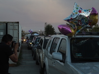 Ciudad Juarez High school students receive their diplomas inside their vehicles at a ''drive in'' graduation ceremony held at the Centro Cul...
