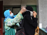 A student wearing a face mask before high school final exam due to the of Coronavirus pandemic on June 21, 2020 in Cairo, Egypt. (