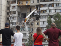 Rescue workers work after a suspected gas explosion in an apartment building in Kiyv, Ukraine, on 21 June 2020. As a result of suspected gas...