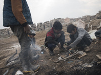 The final phase of melting cooper a group of boy at Al-Mliha, Damascus, Syria on September 2, 2019 melting the cooper that they filtered it...