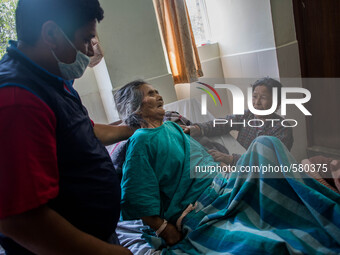 Sanu Maharjan is an earthquake survivor. Teaching Hospital, Kathmandu, Nepal. May 6, 2015. (