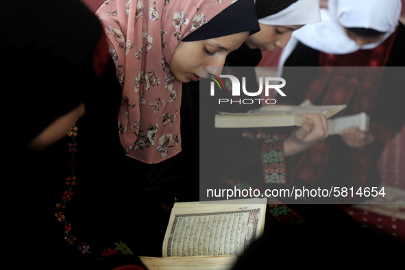 Girls attend a Koran memorization class as Palestinians ease the coronavirus disease (COVID-19) restrictions, in a mosque in Gaza City June...