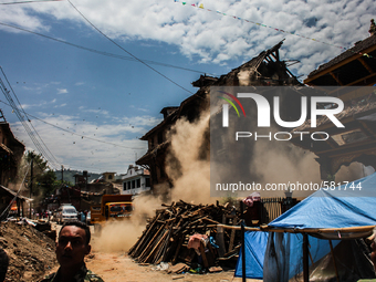 Dust coming out from a broken house during the devastating 7.4 magnitude earthquake at Sankhu, Nepal, 12 May 2015. (