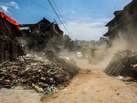 Dust coming out from a broken house during the devastating 7.4 magnitude earthquake at Sankhu, Nepal, 12 May 2015. (