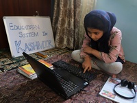 A Student self studies at her home during Covid-19 (coronavirus) pandemic in Sopore Town of District Baramulla Jammu and Kashmir,  India on...