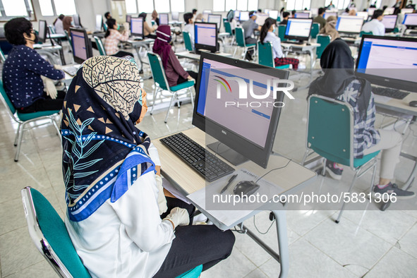 Participants waiting for the test to begin at a campus in the National State University selection test in Depok, West Java, Indonesia, on Ju...